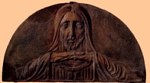 Lunette with Christ. Terracotta by Arturo Martini.